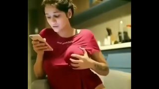 Huge boobs babe pressing her tits hard on cam